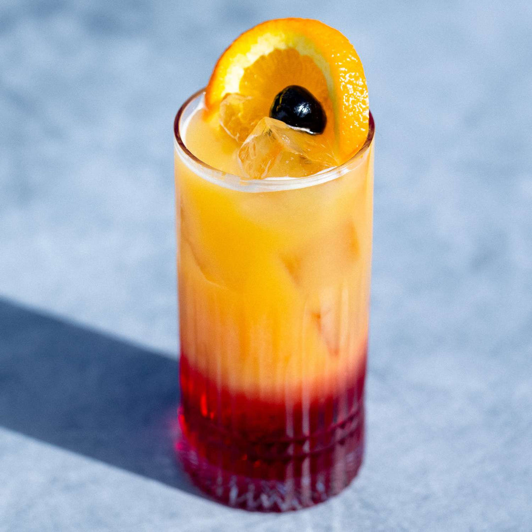 Tequila Sunrise Cocktail Guide: Recipe, Origins & Outfit Pairings