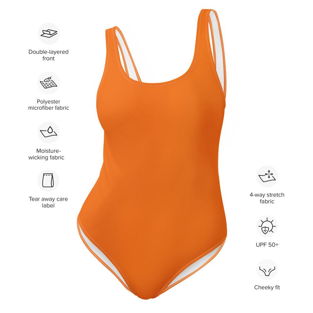 Side view of an orange one-piece swimsuit showcasing the features of the swimsuit.