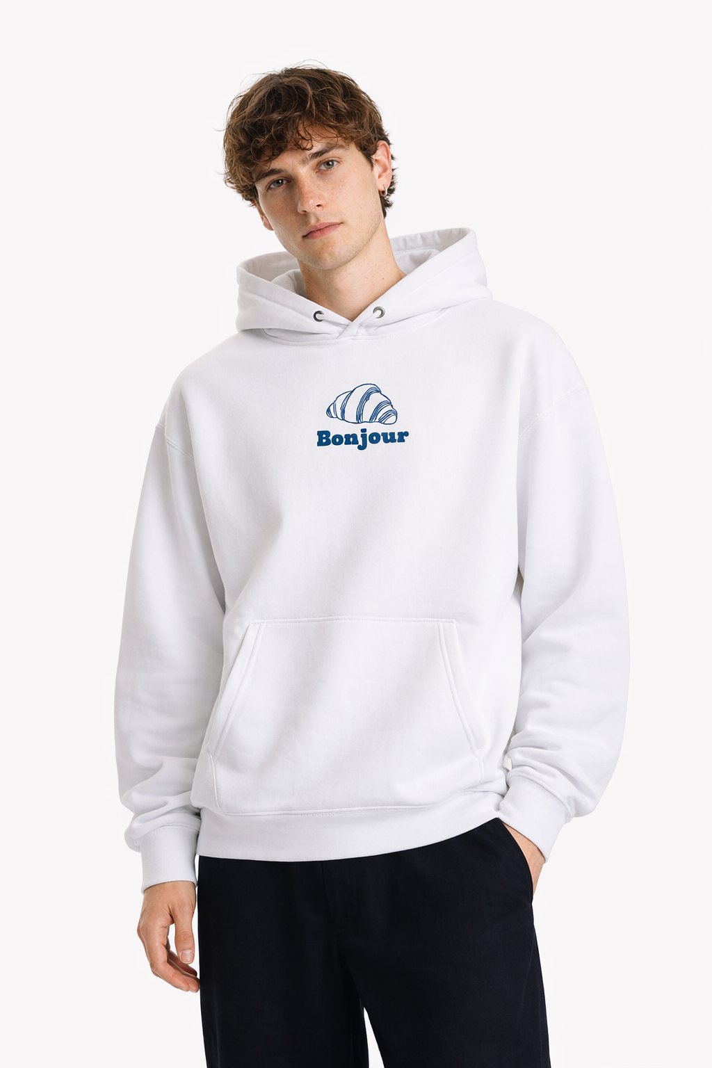 Person wearing a white hoodie with a blue logo and 'Bonjour' text on a white background