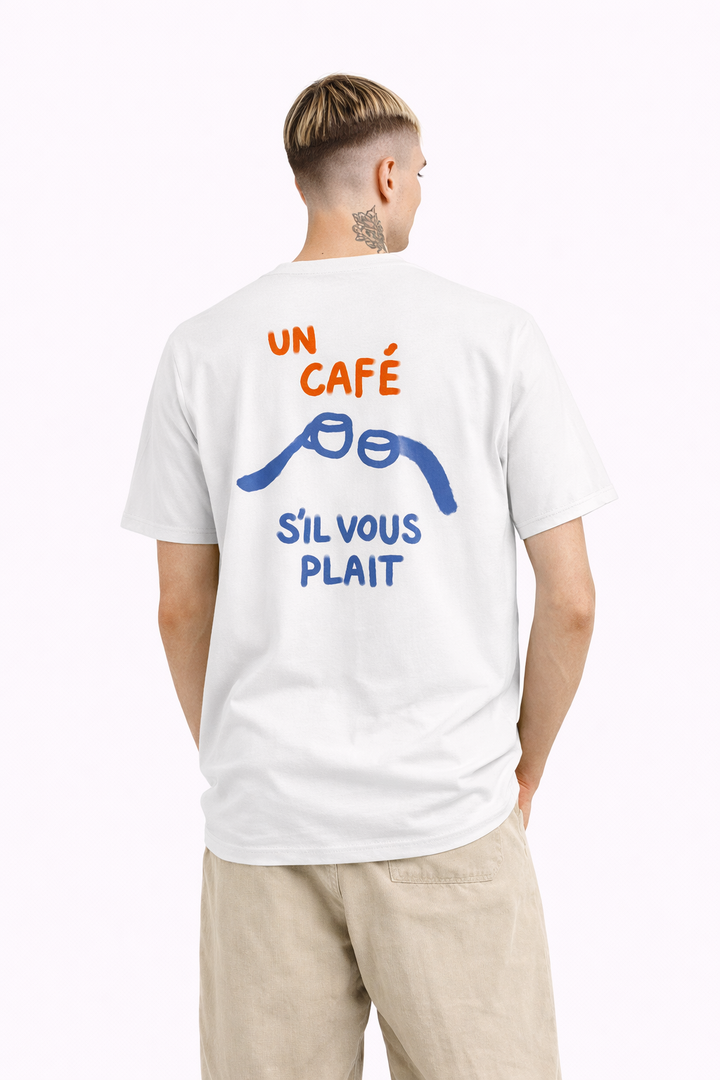 Person wearing a white t-shirt with colorful text and graphics on the back, standing against a white background.