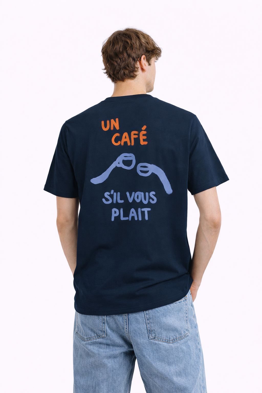 Person wearing a navy blue t-shirt with text and graphics on the back, standing against a white background.