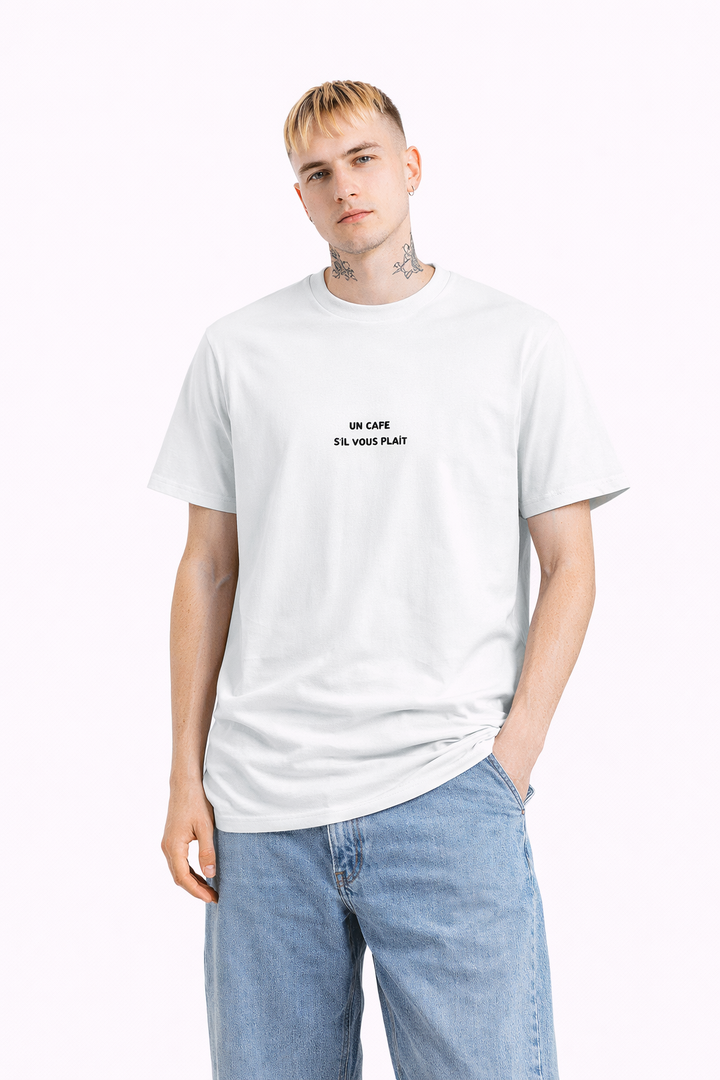 Person wearing a white t-shirt with text and blue jeans on a white background