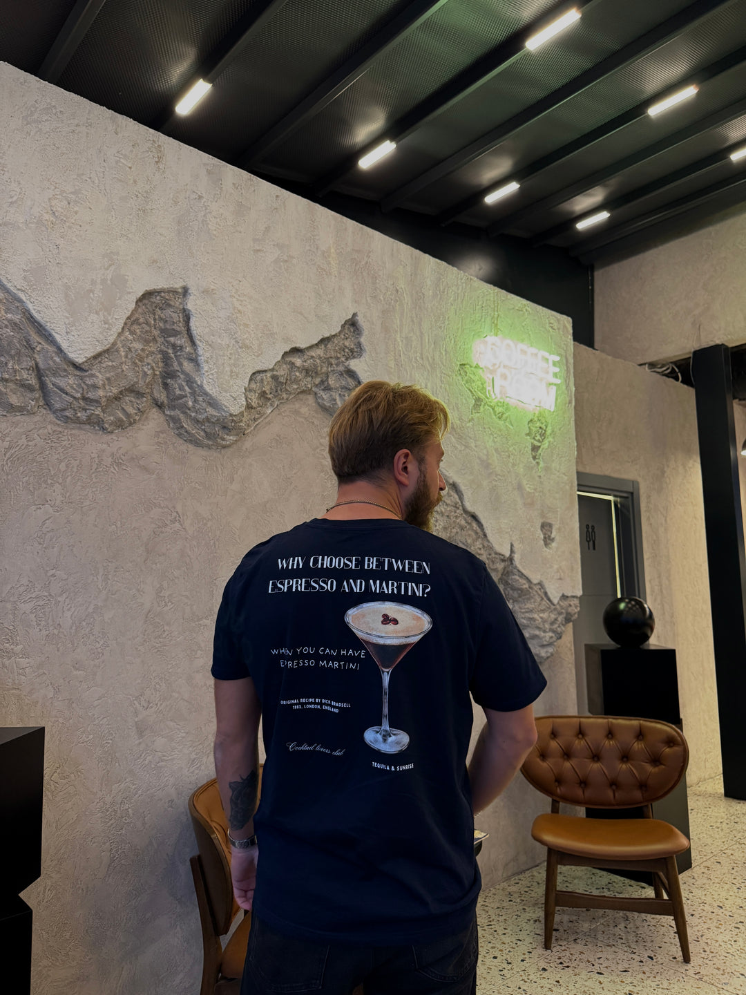 Man wearing Espresso Martini Organic T-shirt, featuring a cocktail graphic and the phrase 'Why choose between Espresso and Martini?'