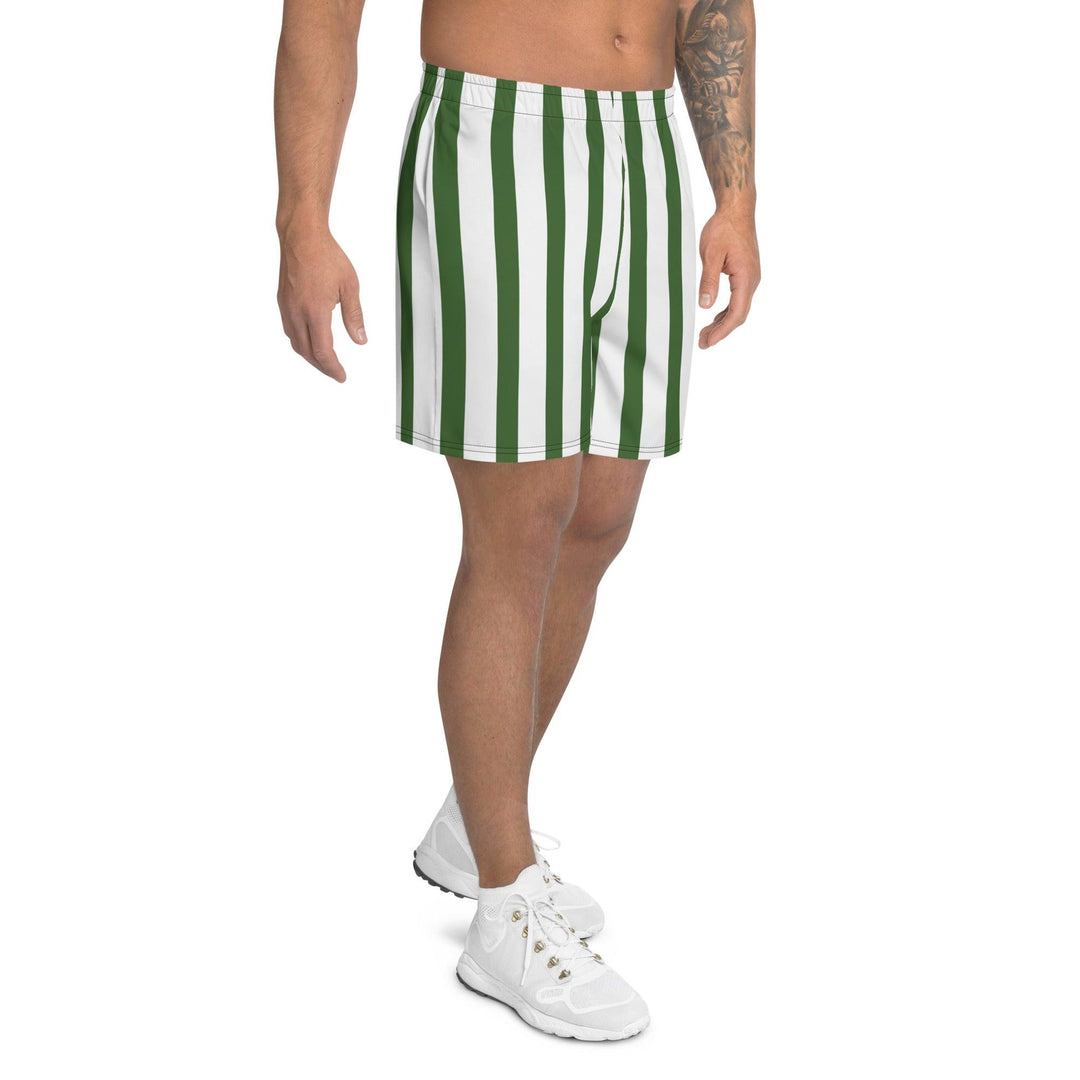 Model wearing men's green athletic shorts, paired with a simple white sneakers, highlighting the breathable fabric and relaxed fit.