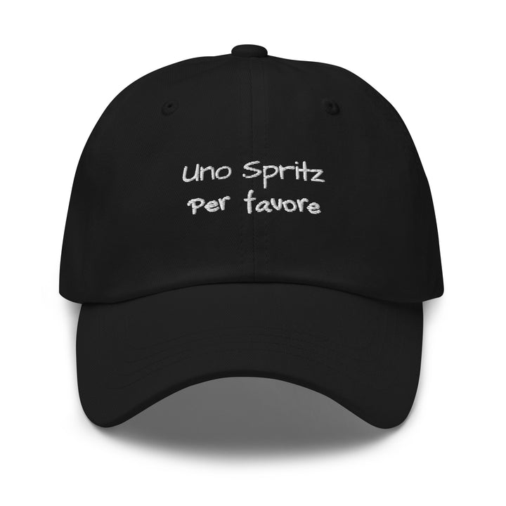 The Uno Spritz Per Favore by Tequila & Sunrise is a black dad hat crafted from chino cotton twill, showcasing white text that reads "uno spritz per favore." It features an adjustable strap for a perfect fit.