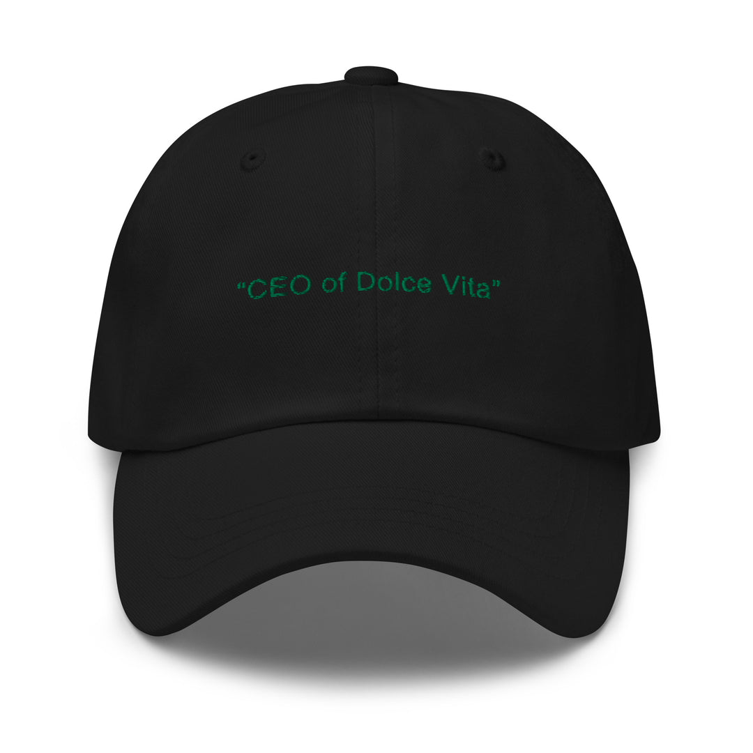 The "CEO of Dolce Vita" hat from Tequila & Sunrise is a black dad cap with a low-profile design, showcasing green text that reads "CEO of Dolce Vita" on the front. It includes an adjustable strap to ensure a perfect fit.