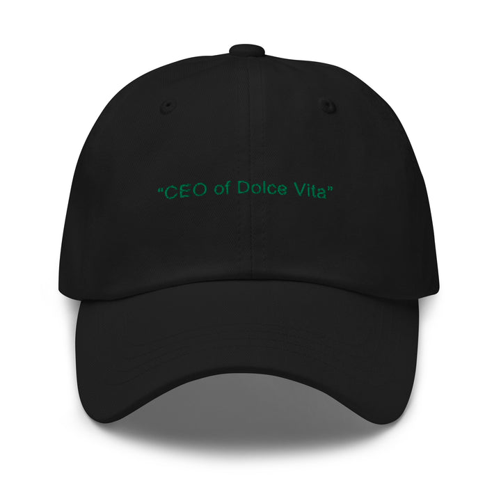 The "CEO of Dolce Vita" hat from Tequila & Sunrise is a black dad cap with a low-profile design, showcasing green text that reads "CEO of Dolce Vita" on the front. It includes an adjustable strap to ensure a perfect fit.