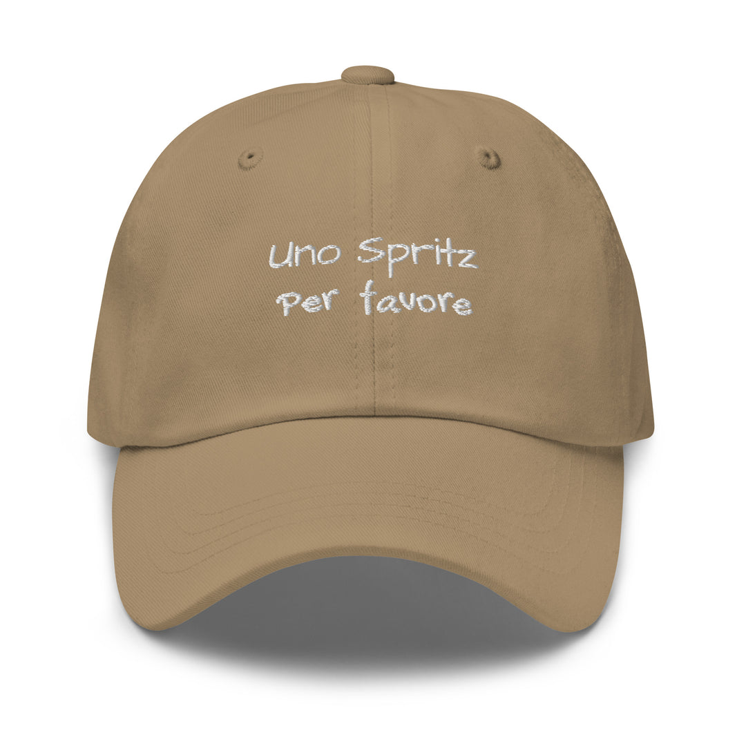 The Uno Spritz Per Favore by Tequila & Sunrise is a khaki dad hat crafted from chino cotton twill, showcasing white text that reads "uno spritz per favore." It features an adjustable strap for a perfect fit.