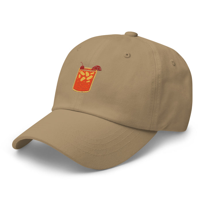 The Tequila & Sunrise Glass Hat, from the brand Tequila & Sunrise, features a fun embroidered orange drink with ice and a straw on the front. Designed with a low-profile structure and an adjustable strap, it offers a comfortable fit for any casual occasion.