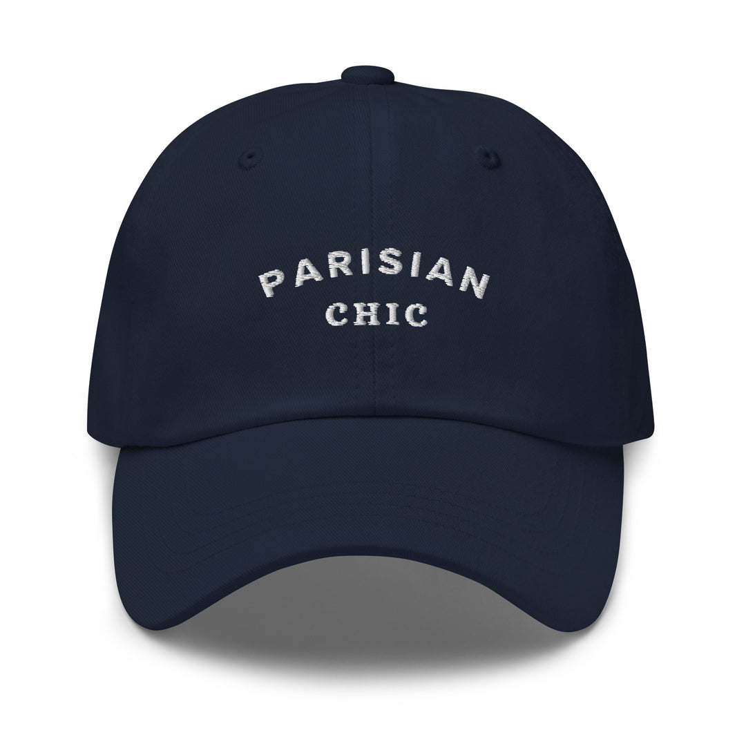 Introducing The Parisian Chic Dad Hat by Tequila & Sunrise: a navy blue baseball cap made from chino cotton twill, adorned with "Parisian Chic" embroidered in white on the front, and equipped with an adjustable strap for the perfect fit.