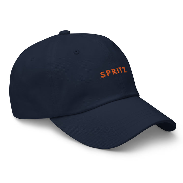 The Tequila & Sunrise Spritz Dad hat is a sleek black baseball cap that showcases "SPRITZ" embroidered in vibrant orange on the front, and it comes with an adjustable strap for a perfect fit.