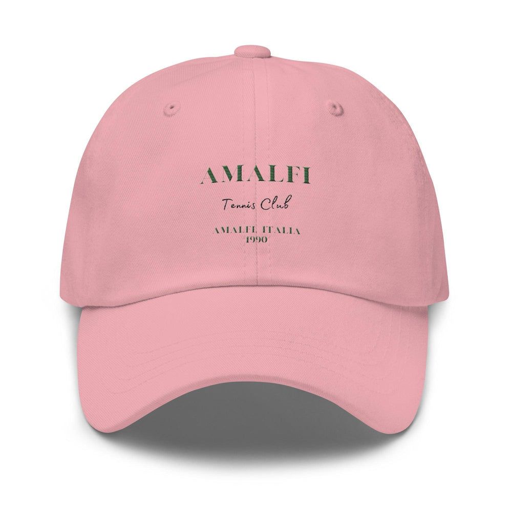 Introducing The Amalfi Tennis Club Italia Hat by Tequila & Sunrise, a classic pink Dad hat adorned with "Amalfi Tennis Club, Amalfi Italia 1990" in green and black print. Made from premium chino cotton twill, it includes an adjustable strap to ensure the perfect fit.