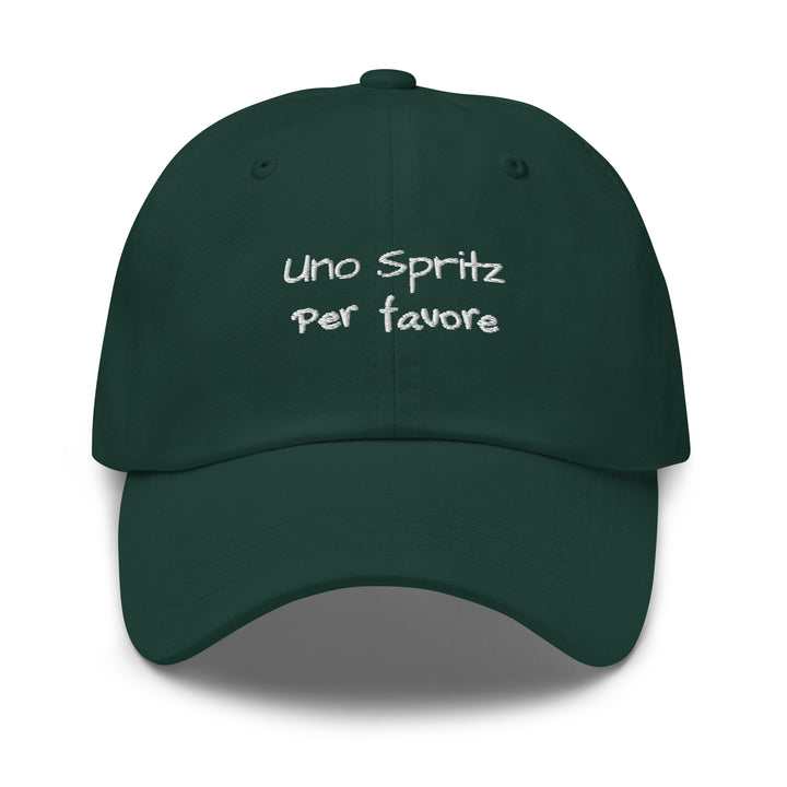 The Uno Spritz Per Favore by Tequila & Sunrise is a green dad hat crafted from chino cotton twill, showcasing white text that reads "uno spritz per favore." It features an adjustable strap for a perfect fit.