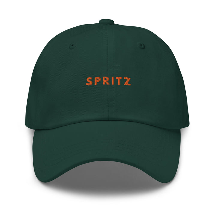 The Spritz Dad hat by Tequila & Sunrise is a dark green, low-profile cap with "SPRITZ" embroidered in orange on the front and an adjustable strap for a perfect fit.