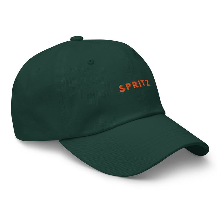 The Spritz Dad Hat by Tequila & Sunrise is a low profile green baseball cap with "SPRITZ" embroidered in orange on the front. It also features an adjustable strap for a perfect fit.