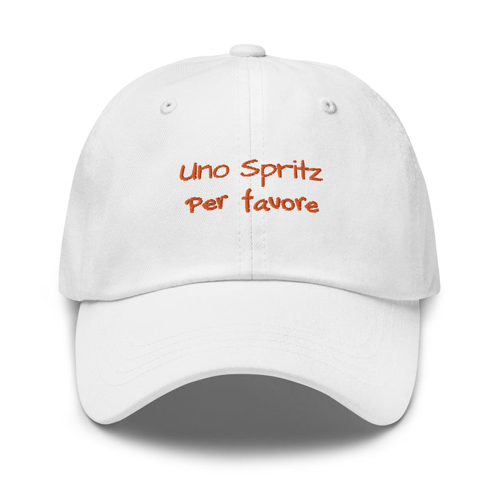 The Uno Spritz Per Favore by Tequila & Sunrise is a whiter dad hat crafted from chino cotton twill, showcasing orange text that reads "uno spritz per favore." It features an adjustable strap for a perfect fit.