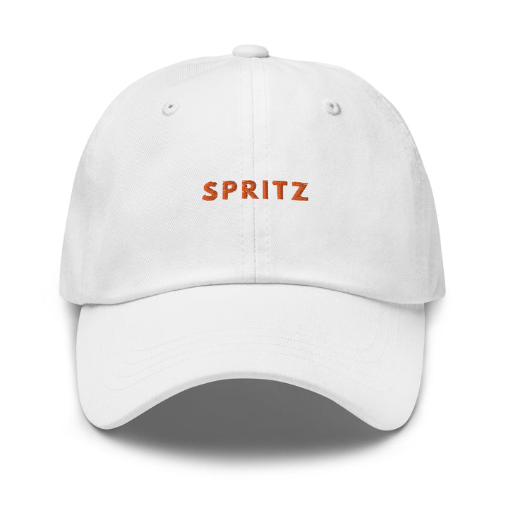 The Spritz Dad hat by Tequila & Sunrise is a low-profile white baseball cap that showcases the word "SPRITZ" in vibrant orange text on the front and includes an adjustable strap for a perfect fit.