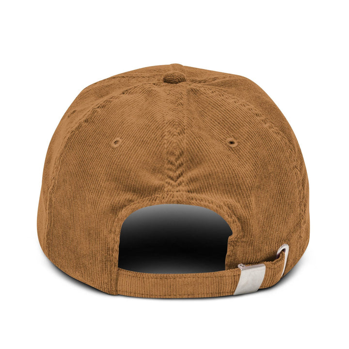 The Champagne Please Corduroy hat by Tequila & Sunrise is crafted from brown cotton corduroy and comes with an adjustable metal buckle at the back, as seen from the rear view.