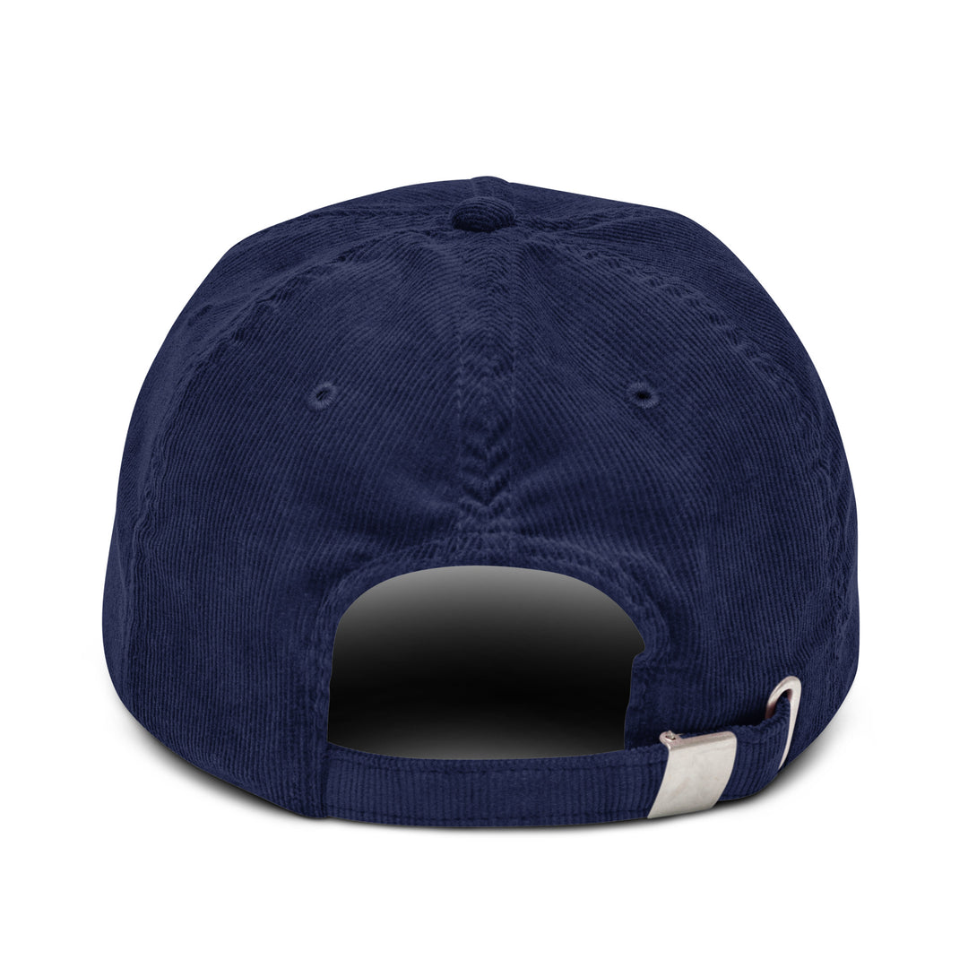 Back view of The Champagne Corduroy hat in navy blue cotton corduroy from Tequila & Sunrise, featuring an adjustable strap with a metal buckle.