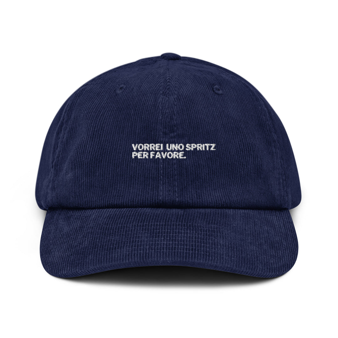 The "Vorrei Uno Spritz Per Favore" Hat by Tequila & Sunrise is a blue dad hat embroidered in white on the front, and it comes with an adjustable strap for an ideal fit.