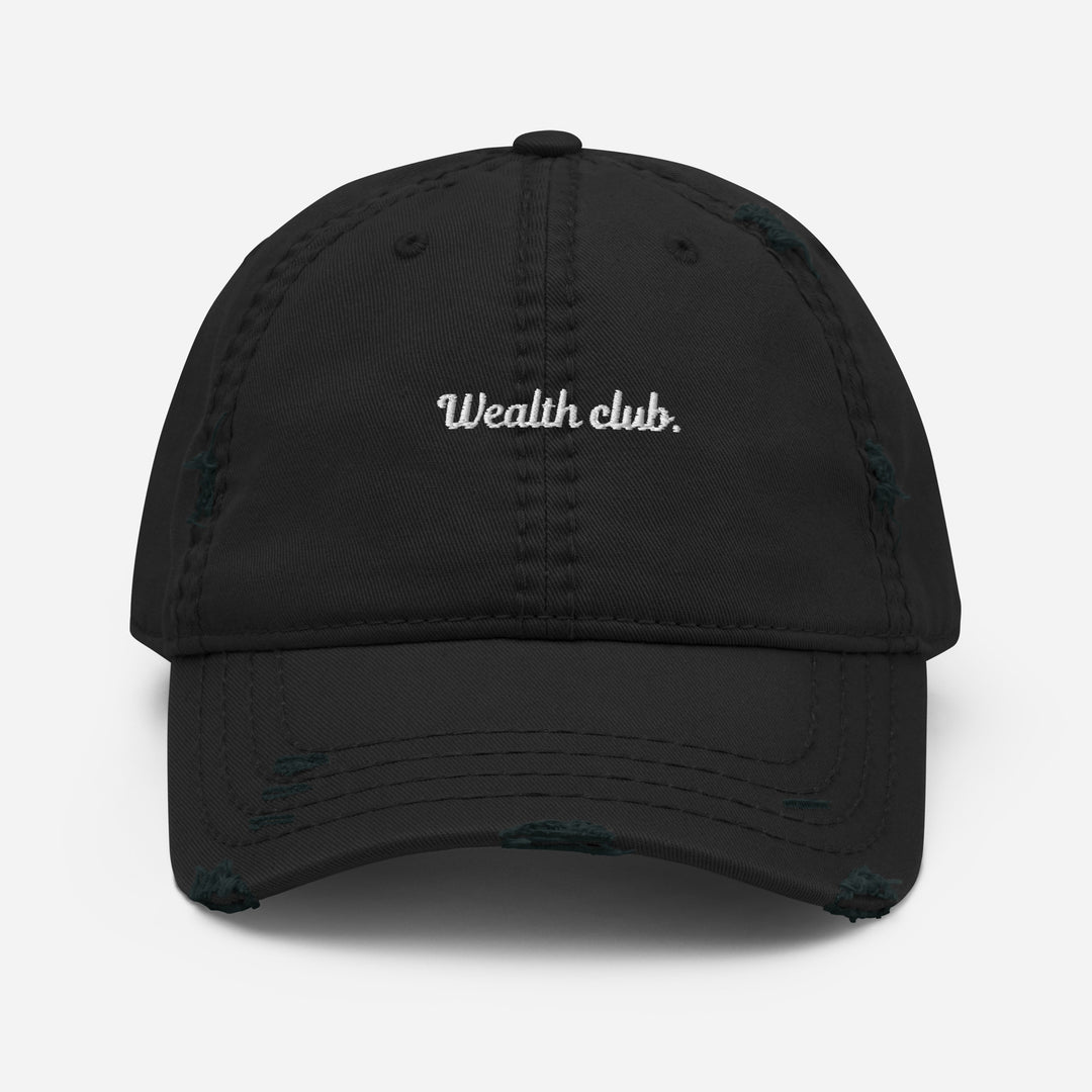 Introducing The Wealth Club Hat by Tequila & Sunrise, a stylish black distressed dad hat featuring the word Wealth Club. elegantly embroidered in white on the front. This cap includes subtle distressing on the brim and panels, making it a chic addition to any sophisticated wardrobe.