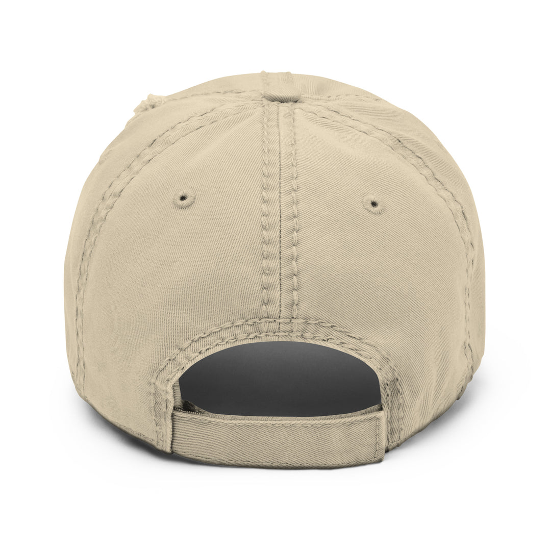 Back view of The CEO of Dolce Vita Hat by Tequila & Sunrise, a beige dad hat crafted from cotton twill for durability. It features an adjustable strap and stitching details, along with a distressed brim that adds a touch of vintage charm.