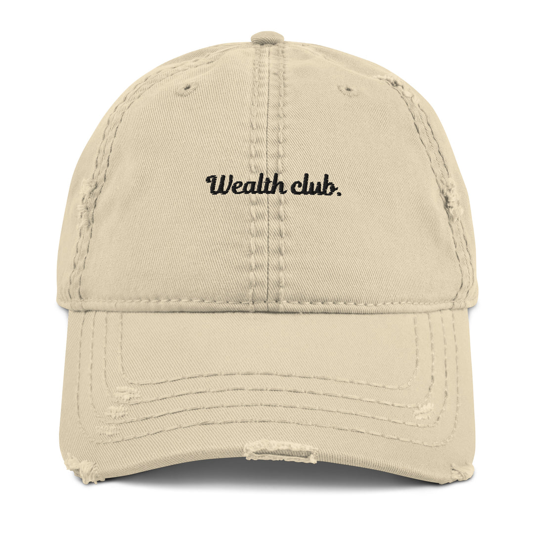 Introducing The Wealth Club Hat by Tequila & Sunrise, a stylish khaki distressed dad hat featuring the word Wealth Club. elegantly embroidered in black on the front. This cap includes subtle distressing on the brim and panels, making it a chic addition to any sophisticated wardrobe.