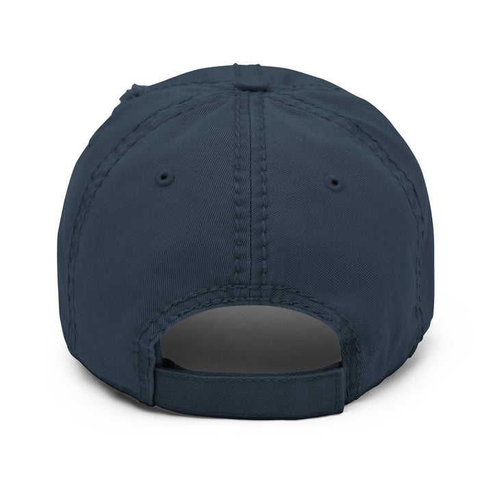 The CEO of Dolce Vita Hat by Tequila & Sunrise is displayed from the back, showcasing a distressed brim with an adjustable strap and embroidered eyelets. Its cotton twill fabric adds durability and style to this timeless accessory.