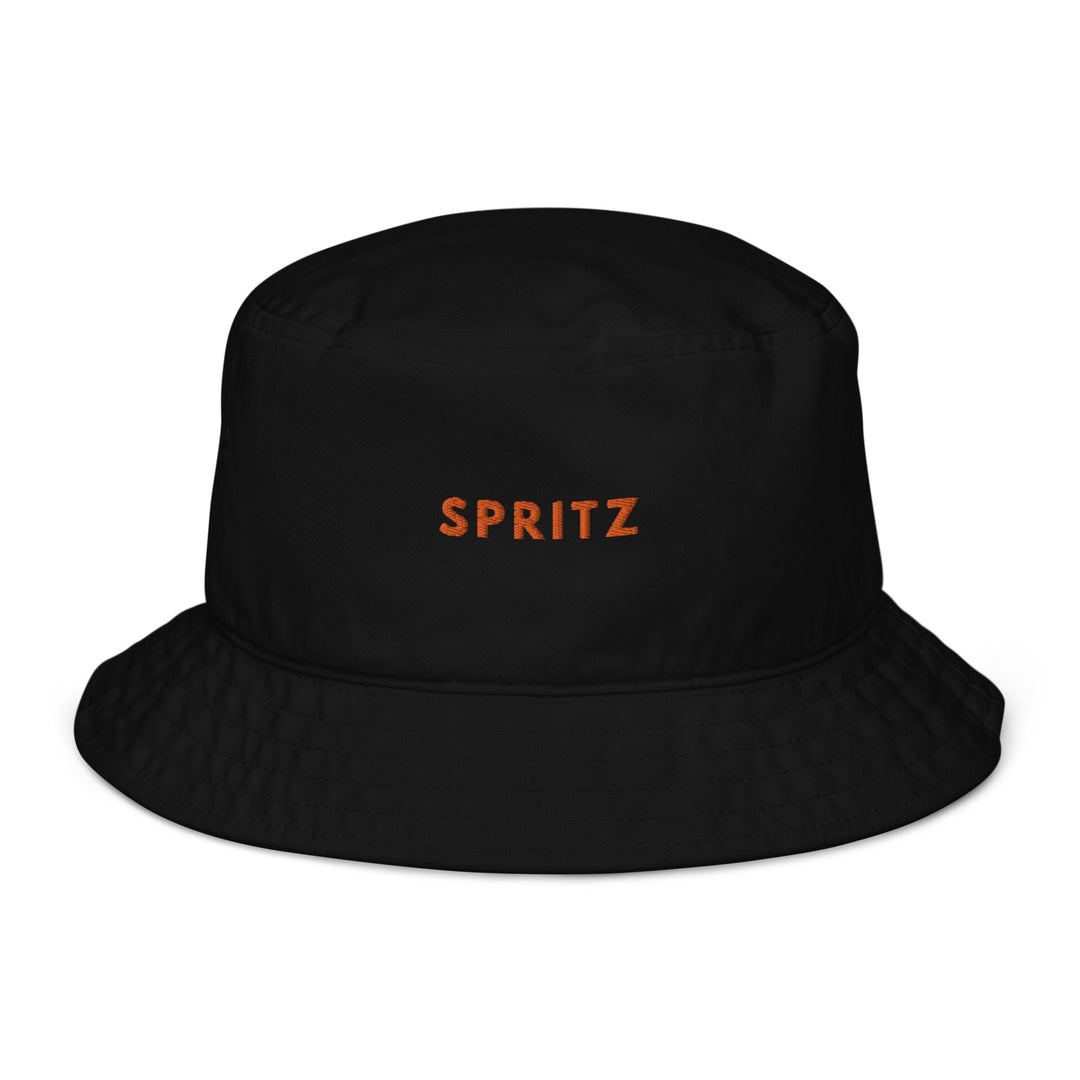 The Spritz Organic Bucket Hat by Tequila & Sunrise is a black bucket hat crafted from 100% organic cotton, with the word SPRITZ prominently displayed in bold orange on the front.