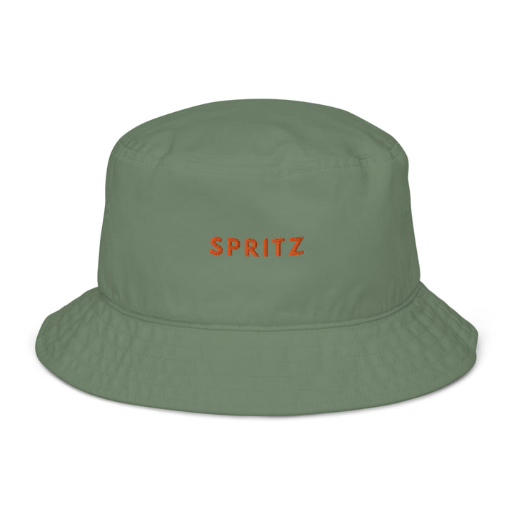 The Spritz Organic Bucket Hat by Tequila & Sunrise is designed in green with "SPRITZ" embroidered in orange on the front, and it is made from 100% cotton for an eco-friendly touch.