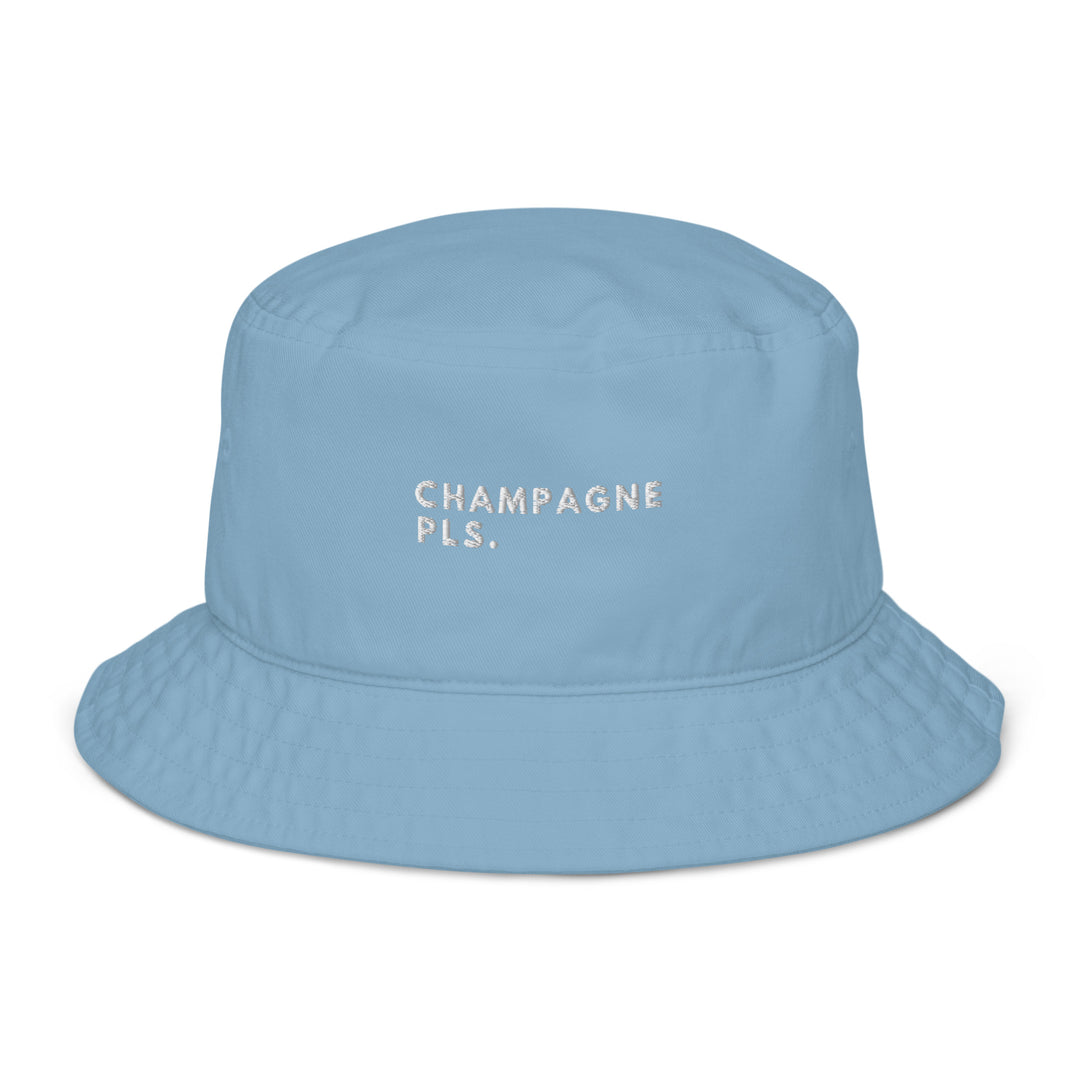 The Champagne Please Organic Bucket Hat by Tequila & Sunrise is a light blue bucket hat, featuring the embroidered text "CHAMPAGNE PLS." in white, made from 100% cotton twill for an eco-friendly touch.