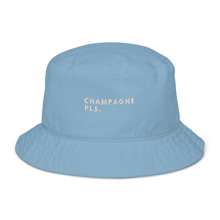 The Champagne Please Organic Bucket Hat by Tequila & Sunrise is a light blue bucket hat, featuring the embroidered text "CHAMPAGNE PLS." in white, made from 100% cotton twill for an eco-friendly touch.