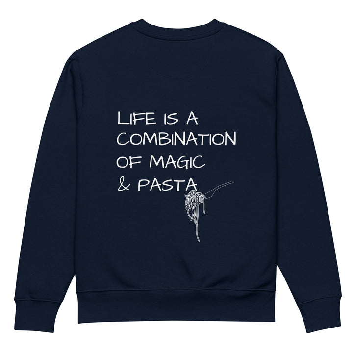 The Magic & Pasta Eco Sweatshirt by Tequila & Sunrise is a unisex garment in navy blue, featuring the phrase "Life is a combination of magic & pasta" in white alongside a minimalist line drawing of a fork twirling spaghetti. Made from organic cotton, this sweatshirt offers an ideal choice for individuals who value sustainable fashion.