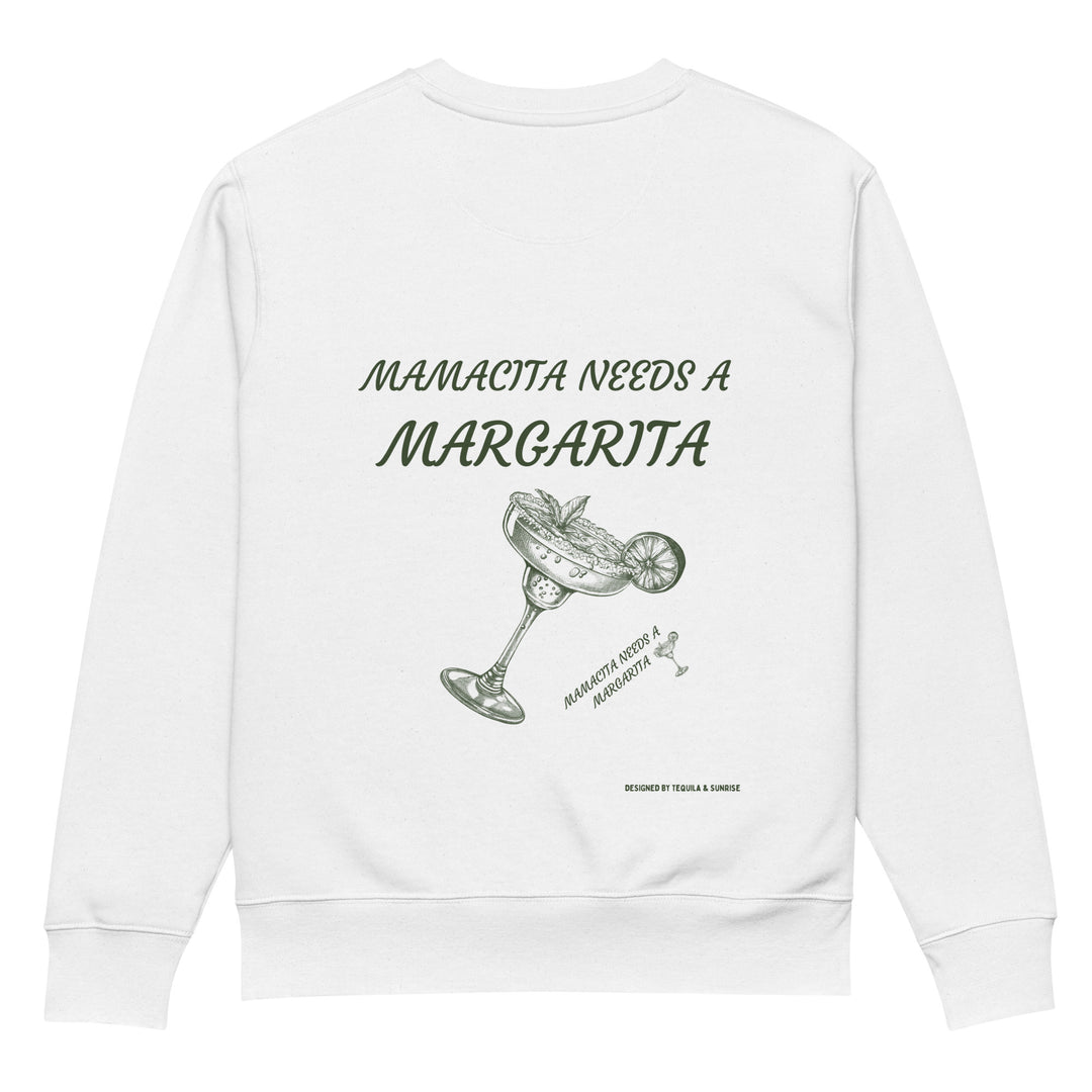 The Mamacita Needs a Margarita Eco Sweatshirt by Tequila & Sunrise showcases a fun design with "Mamacita Needs a Margarita" in green, alongside a playful illustration of a margarita glass complete with cocktail and lime wedge. This white organic cotton sweatshirt is ideal for those who value both sustainable fashion and whimsical style.