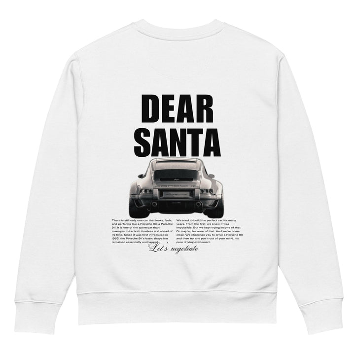 Introducing "The Dear Santa Organic Sweatshirt" from Tequila & Sunrise: This white unisex tee features the phrase 'Dear Santa' above a car's rear view image, with additional text and a delicate decorative line, ending with "Let's negotiate" in elegant script. Crafted from eco-friendly organic cotton for sustainability.