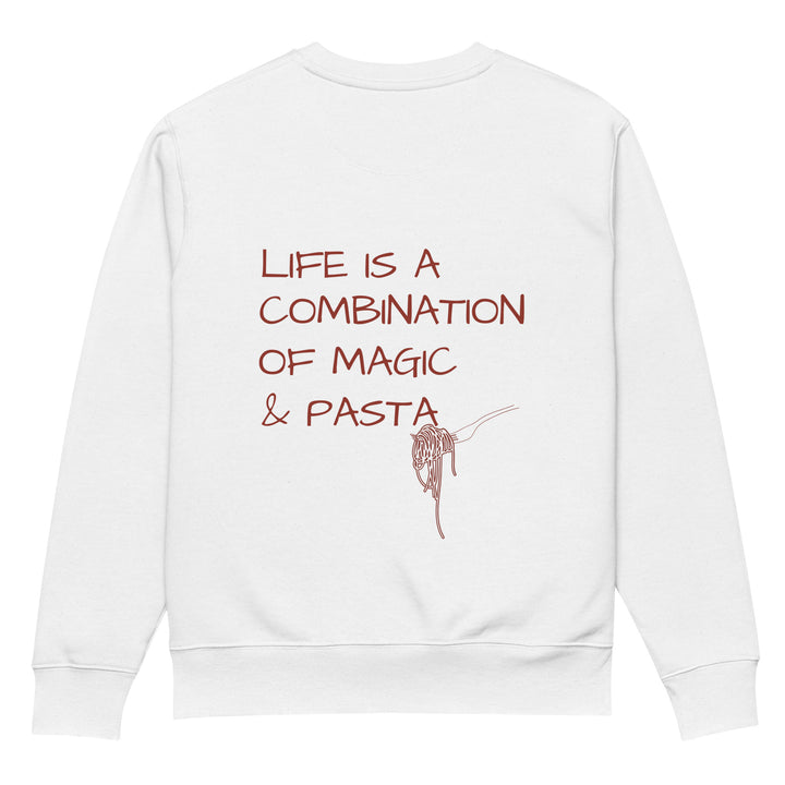 Introducing The Magic & Pasta Eco Sweatshirt by Tequila & Sunrise: a unisex sustainable fashion piece crafted from organic cotton. This white sweatshirt is adorned with the phrase *Life is a combination of magic & pasta* in brown lettering, paired with an illustration of a fork filled with spaghetti, combining charm and eco-friendliness.