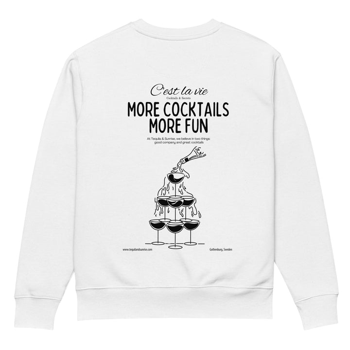 Back of The More Cocktails More Fun Eco Sweatshirt by Tequila & Sunrise showcases an illustration of a cocktail tower pouring into three glasses. The text reads "C'est la vie, more cocktails, more fun" with a tagline about enjoying good company and great drinks. Made from organic cotton for sustainable fashion lovers. Website link included below.