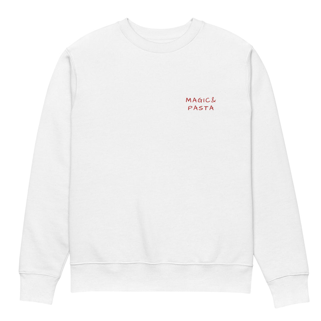 The Magic & Pasta Eco Sweatshirt by Tequila & Sunrise is a white unisex garment made from organic cotton, displaying the words "Magic & Pasta" in small red letters on the left chest. This piece showcases sustainable fashion with its straightforward design and timeless crew neck.