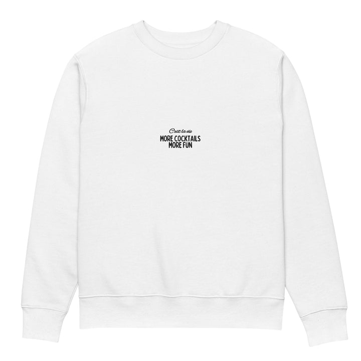 Explore the Tequila & Sunrise unisex eco-friendly sweatshirt, made from organic cotton. This essential white garment boasts a stylish crew neck and long sleeves, elegantly displaying black text that reads "The More Cocktails More Fun," capturing the spirit of sustainable fashion with a touch of sophistication.