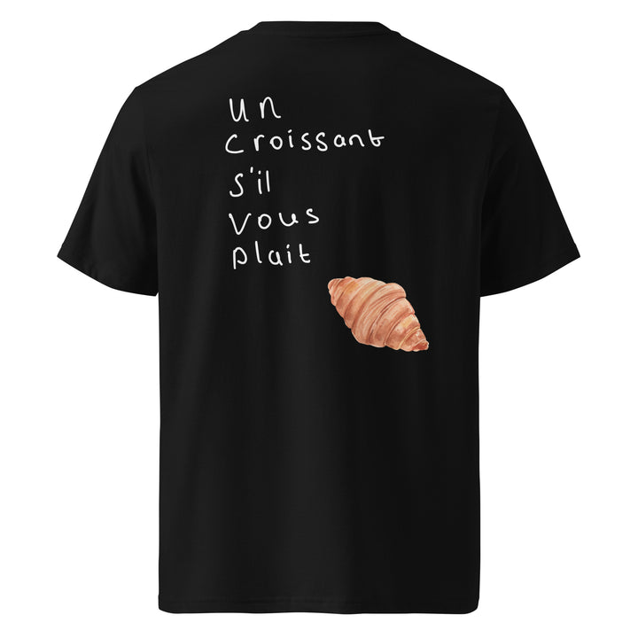 Un Croissant S’il Vous Plait Organic T-shirt with graphic design on black background.