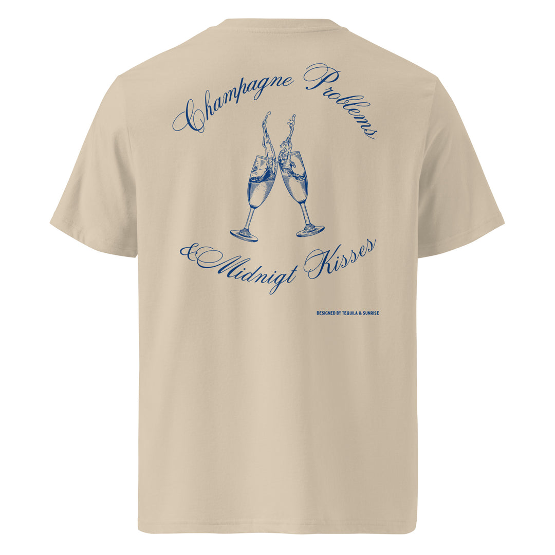 Champagne Problems & Midnight Kisses Organic T-shirt featuring a flirty design with champagne glasses.