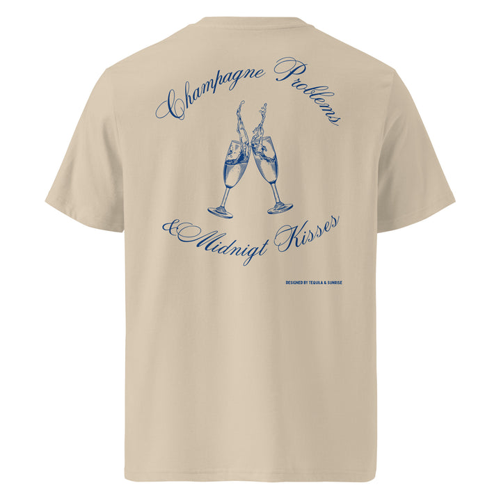 Champagne Problems & Midnight Kisses Organic T-shirt featuring a flirty design with champagne glasses.