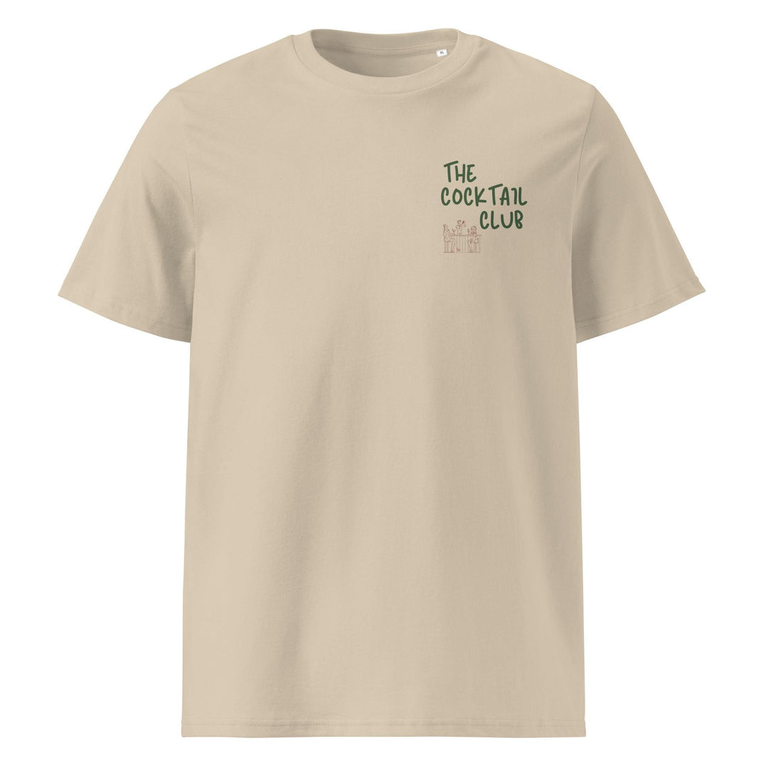 The Cocktail Club Organic T-shirt by Tequila & Sunrise is a unisex beige t-shirt featuring the iconic logo in green and beige on the upper left, made from eco-friendly, organic cotton.