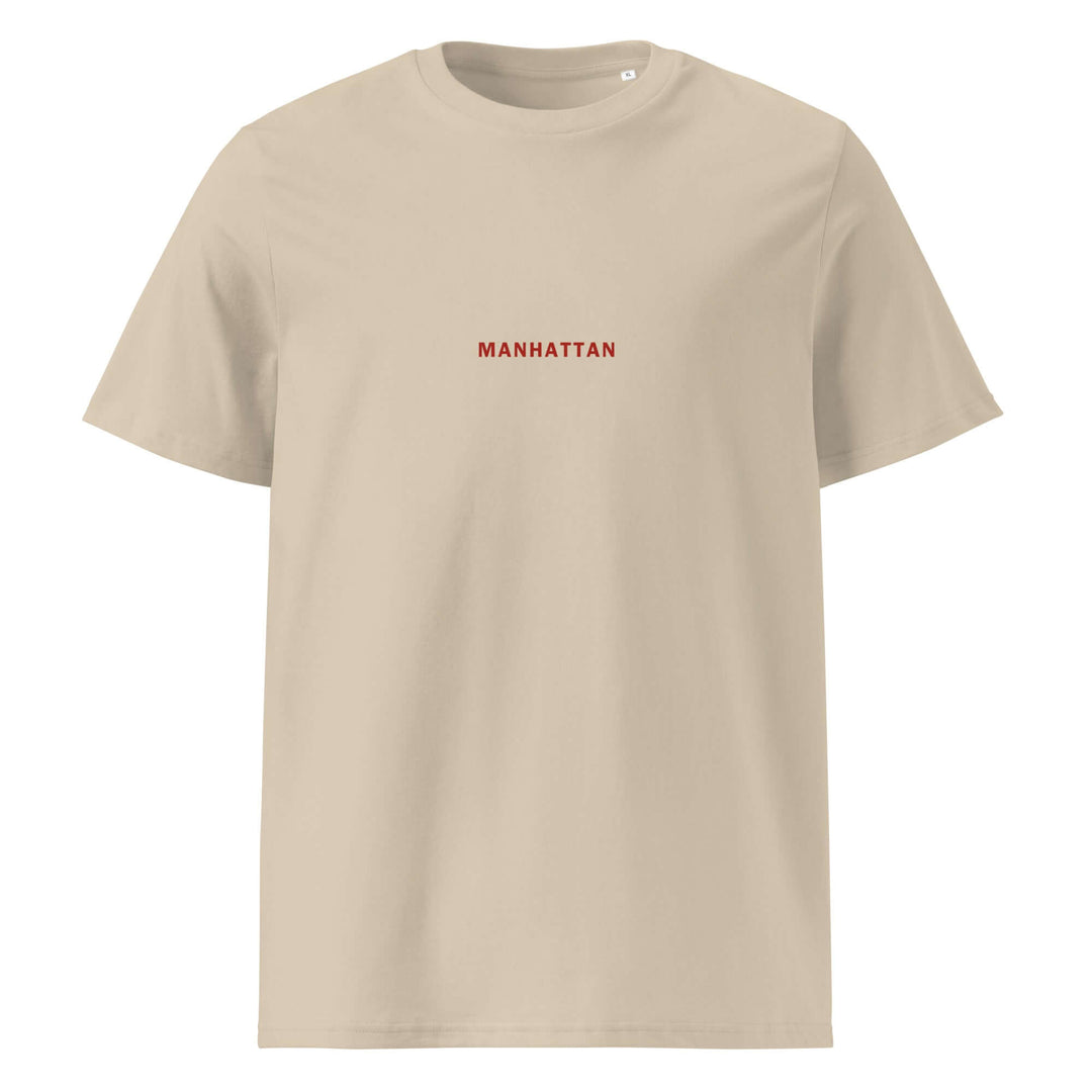 Manhattan Organic T-shirt in beige with red 'MANHATTAN' text, made from 100% organic ring-spun cotton.