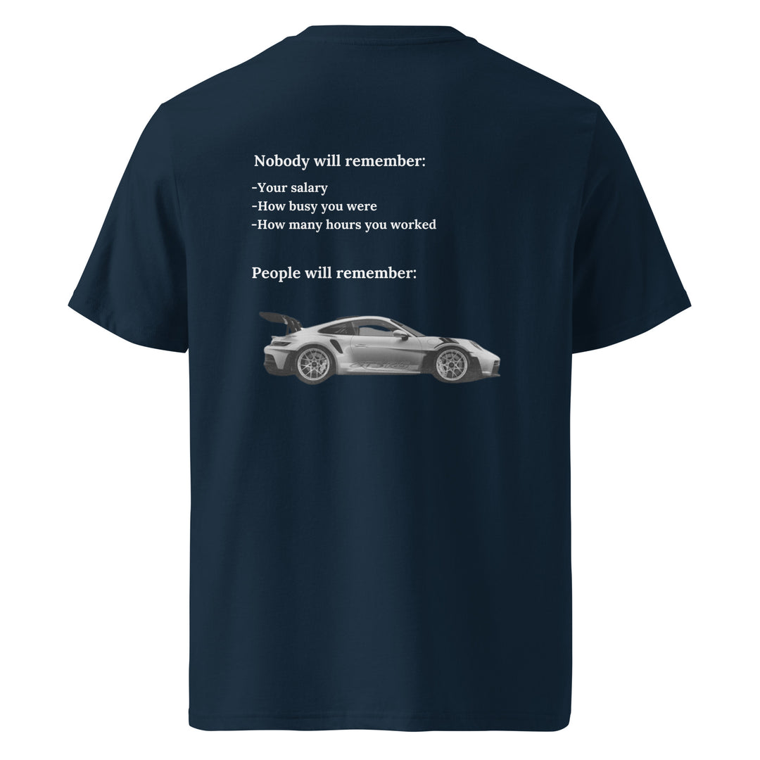 Introducing the Tequila & Sunrise "The Porsche Nobody Will Remember You" Organic T-shirt: a unisex black tee made from eco-friendly organic cotton, showcasing striking text about memory with an elegant sports car image.