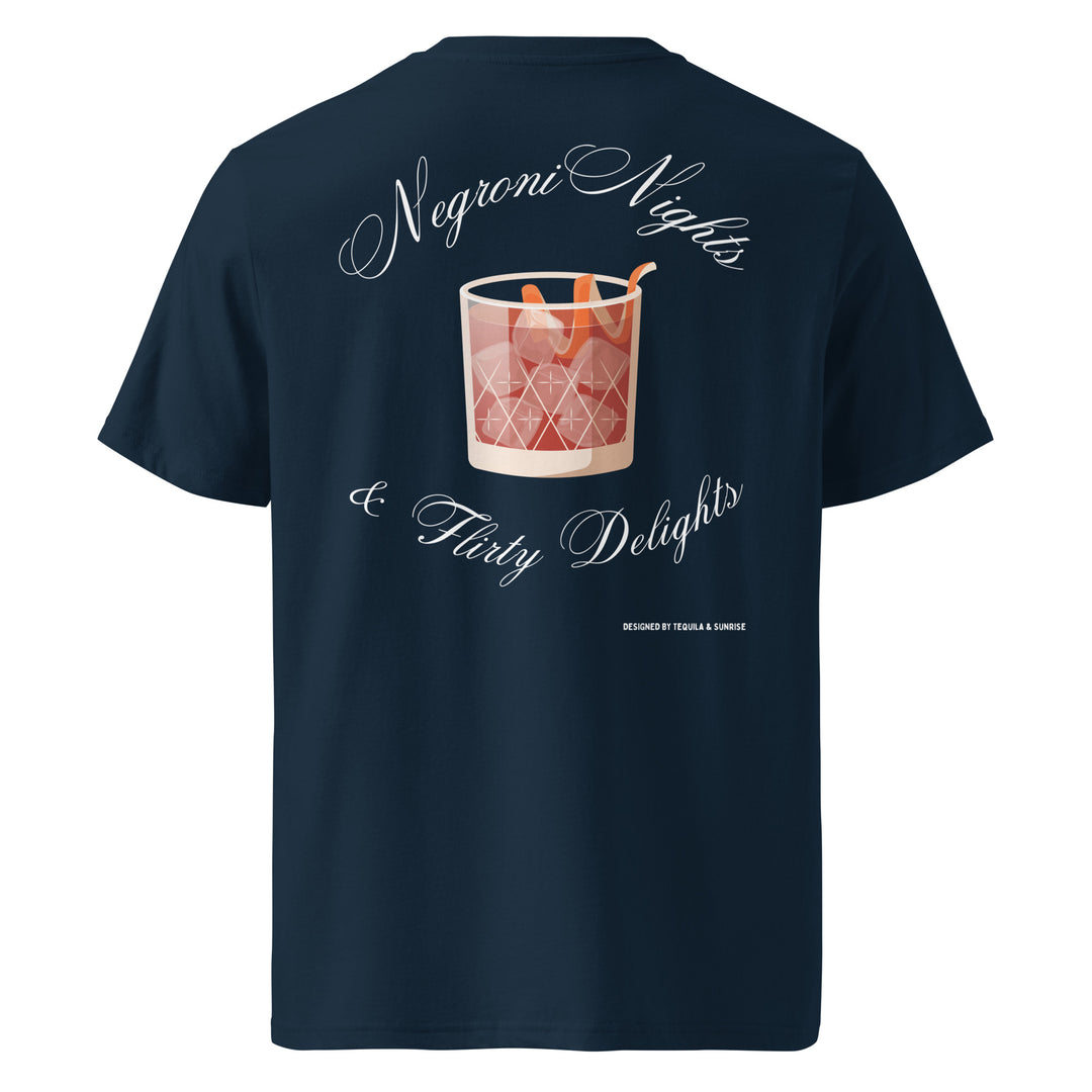 Introducing "The Negroni Nights & Flirty Delights Organic T-shirt" by Tequila & Sunrise, a navy blue unisex t-shirt crafted from eco-friendly organic cotton. It showcases a printed design of a Negroni cocktail glass and the text "Negroni Nights & Flirty Delights" on the back, offering a stylish choice that’s gentle on both you and the planet.