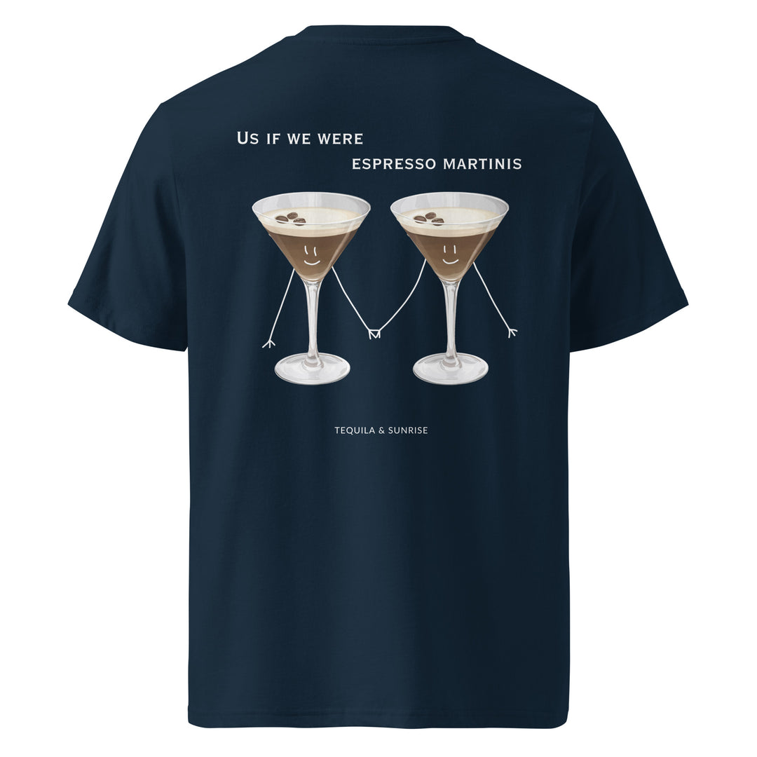 This unisex t-shirt, known as "The If We Were Espresso Martinis Organic T-shirt" by Tequila & Sunrise, is an eco-friendly choice made from organic cotton. It showcases two cartoon espresso martinis holding hands and smiling, accompanied by the text "Us if we were Espresso Martinis," above the brand name "Tequila & Sunrise." It's a playful addition for any cocktail enthusiast.