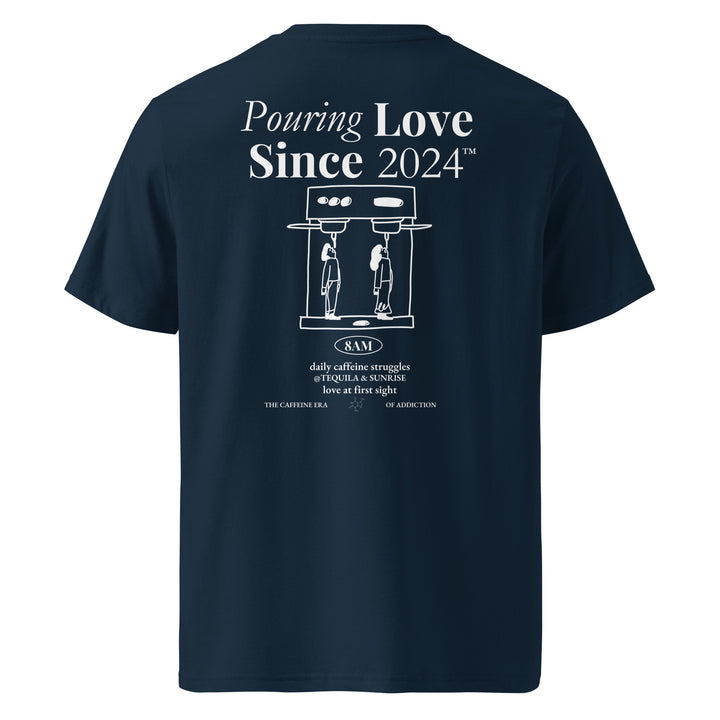 Daily Caffeine Struggles Organic T-shirt featuring a creative design with the slogan 'Pouring Love Since 2024'.