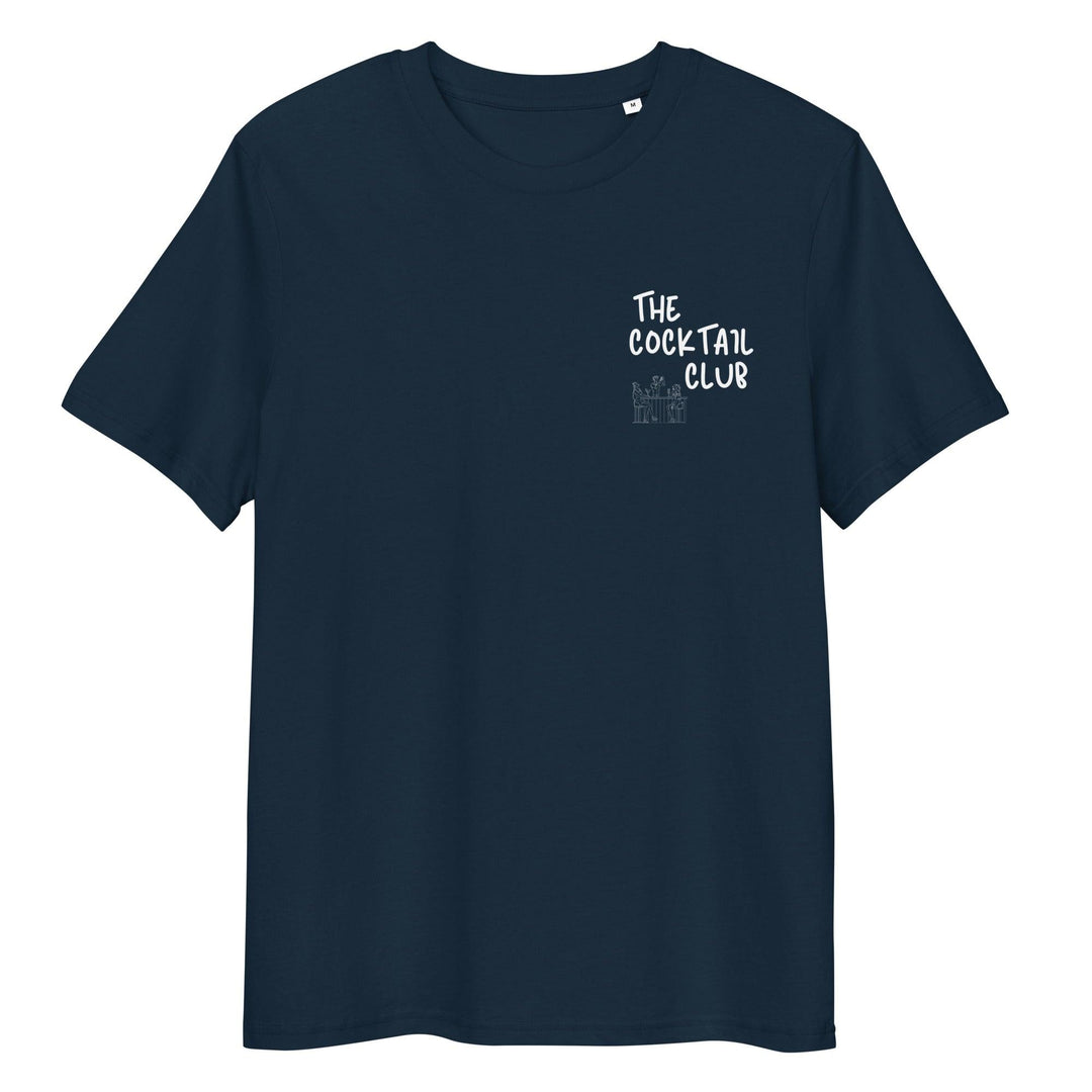 The Cocktail Club Organic T-shirt by Tequila & Sunrise combines eco-friendly fashion with style. This navy blue unisex t-shirt, made from organic cotton, showcases "The Cocktail Club" text and a small graphic on the front, offering both comfort and sustainability in a chic package.