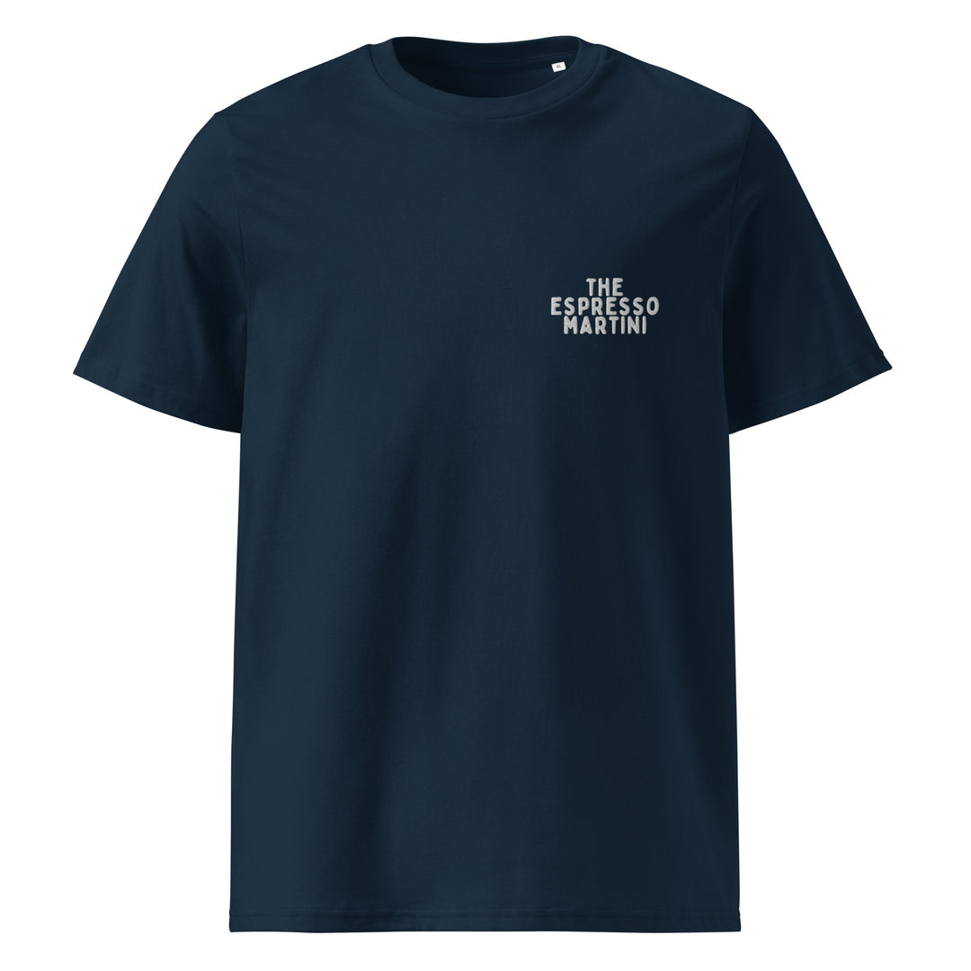 A navy blue unisex t-shirt, named "The If We Were Espresso Martinis Organic T-shirt" by Tequila & Sunrise, features the text THE ESPRESSO MARTINI in small white letters on the upper left chest area and is crafted from eco-friendly organic cotton.